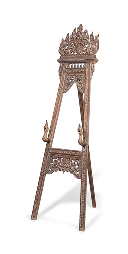 A BURMESE CARVED TEAK EASEL 
LATE 19TH  EARLY 20TH CENTURY 
The pierced foliate cresting centred