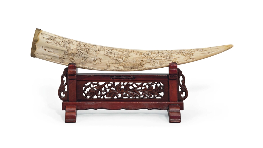 A Japanese Carved Marine Ivory Tusk with Stand 
Signed Kogyoku, Meiji period (late 19th century)