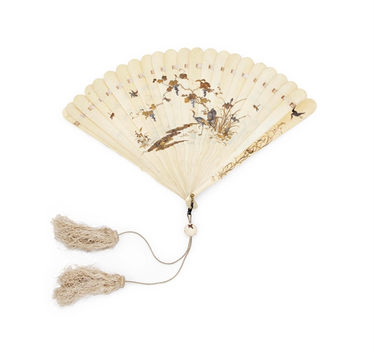 A Japanese Ivory Fan 
Meiji period (late 19th century) 
Decorated in gold, silver and red hiramaki-