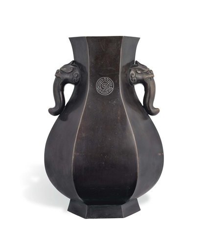 A Japanese Bronze Vase 
Meiji period (late 19th century) 
Of hexagonal form with a stylised