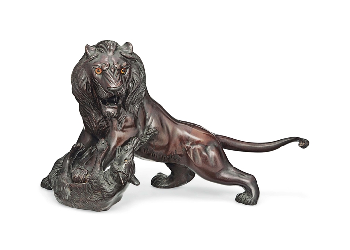 A Japanese Animalier Bronze 
Meiji period (late 19th century) 
Cast as a lion attacking on a wolf,