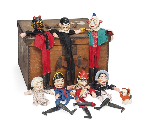 AN EDWARDIAN PUNCH AND JUDY PUPPET SET 
CIRCA 1915 
With carved and brightly painted wood heads