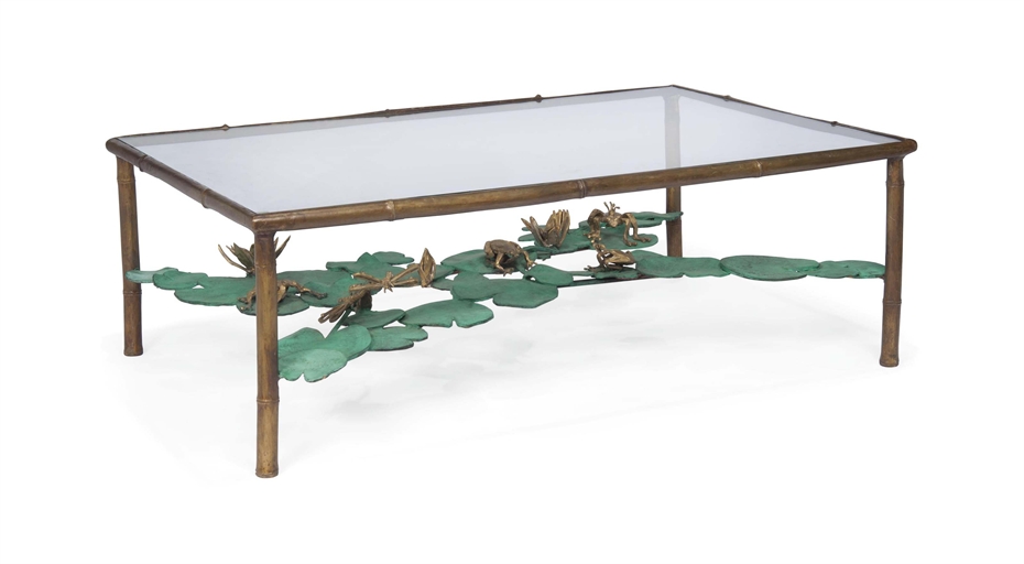 A BELGIAN PATINATED AND GILT BRONZE 'NENUPHAR' COFFEE TABLE 
BY PAULA SWINNEN 
The stretcher