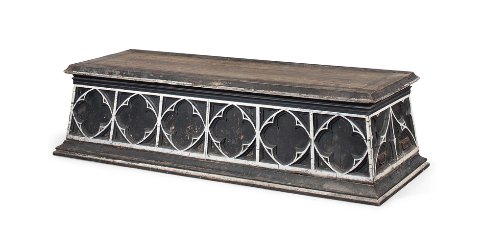 A VICTORIAN GOTHIC PAINTED PINE COFFIN STAND 
MID-19TH CENTURY 
In the form of a plinth, with
