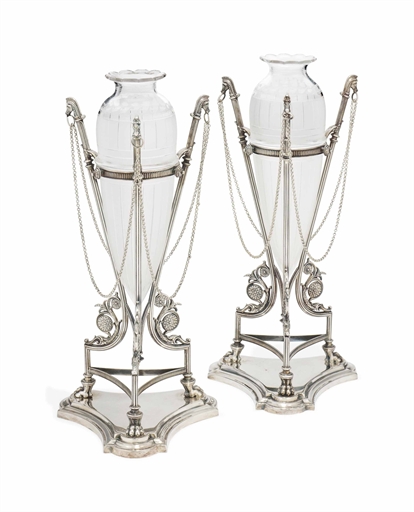 A PAIR OF VICTORIAN ELECTRO-PLATED VASE STANDS WITH ETCHED GLASS VASES 
WITH DESIGN REGISTRATION