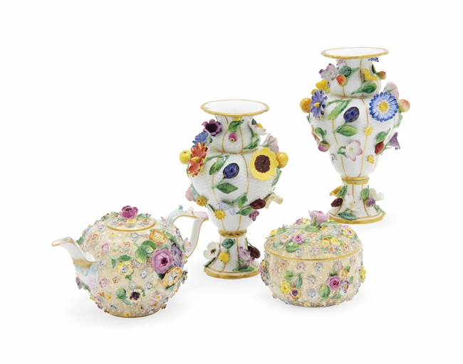 A PAIR OF MEISSEN FRUIT AND FLOWER-ENCRUSTED VASES, A FLOWER-ENCRUSTED TEAPOT AND COVER AND A