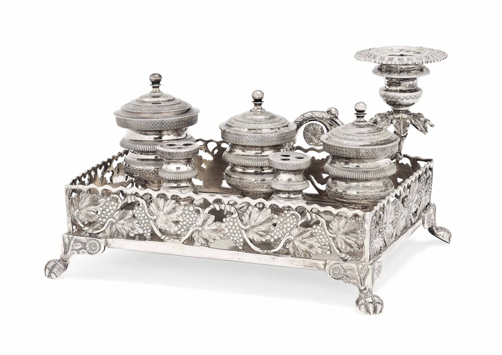 A SILVER INKSTAND 
INDISTINCTLY MARKED ONCE TO BASE, PROBABLY BRAZILIAN, CIRCA 1830 
The gallery