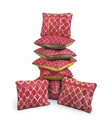 NINE CERISE SWAT-VALLEY EMBROIDERY CUSHIONS 
BY COLEFAX AND FOWLER, MODERN 
Four with ochre-coloured