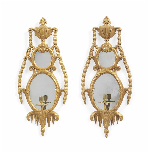 A PAIR OF GEORGE III-STYLE GILTWOOD GIRANDOLES 
MODERN 
Ornamented with trailing husk swags 
29¼ in.