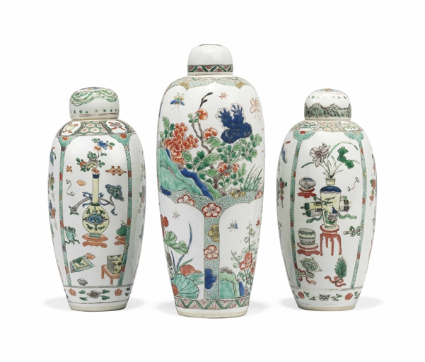 THREE CHINESE SLENDER OVOID JARS AND COVERS 
KANGXI PERIOD (1662-1722) 
Comprising a pair and a