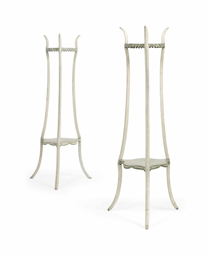 A PAIR OF WHITE AND GREEN PAINTED STANDS 
PROBABLY 18TH CENTURY, THE OTHER, 20TH CENTURY 
The