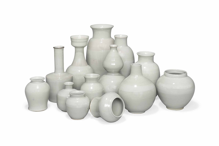 A GROUP OF THIRTEEN CHINESE BLANC-DE-CHINE-STYLE GLAZED VESSELS 
MODERN 
Each of varying form 
The