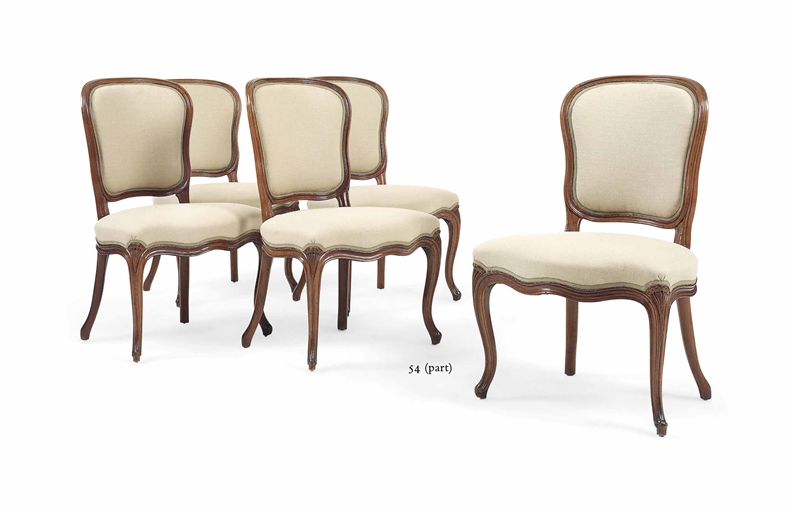 A SET OF SIX LOUIS XV WALNUT SIDE CHAIRS 
MID-18TH CENTURY 
Each with cartouche-shaped back on