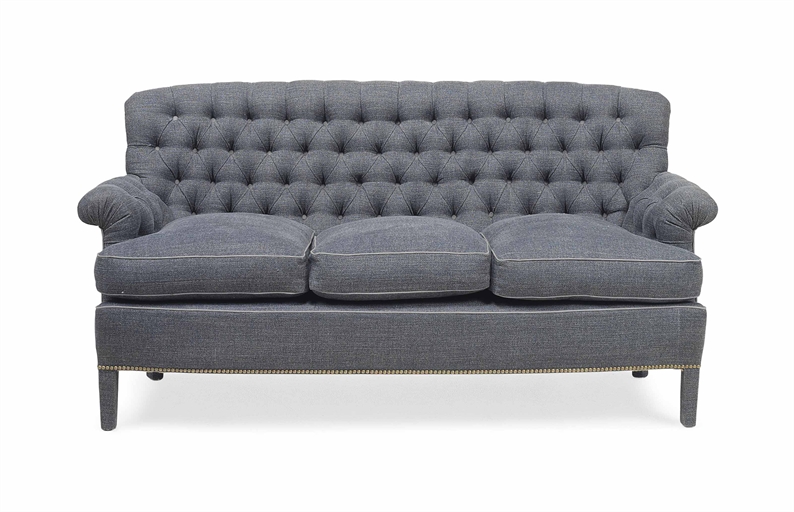 A FRENCH BUTTONED-DOWN THREE-SEAT SOFA 
SECOND HALF 20TH CENTURY 
Covered in indigo coloured cotton