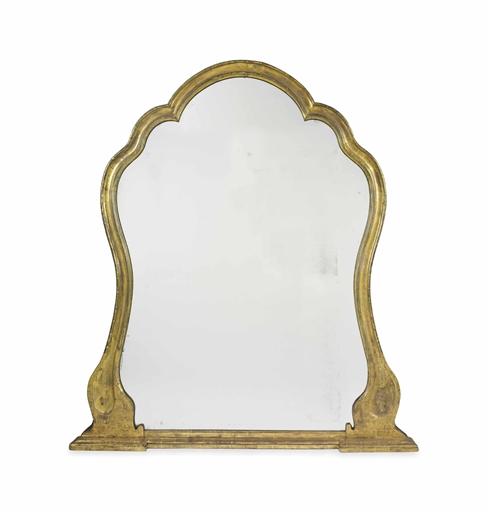 AN ITALIAN GILTWOOD OVERMANTEL 
19TH CENTURY, POSSIBLY VENICE 
Of arched form with shaped sides