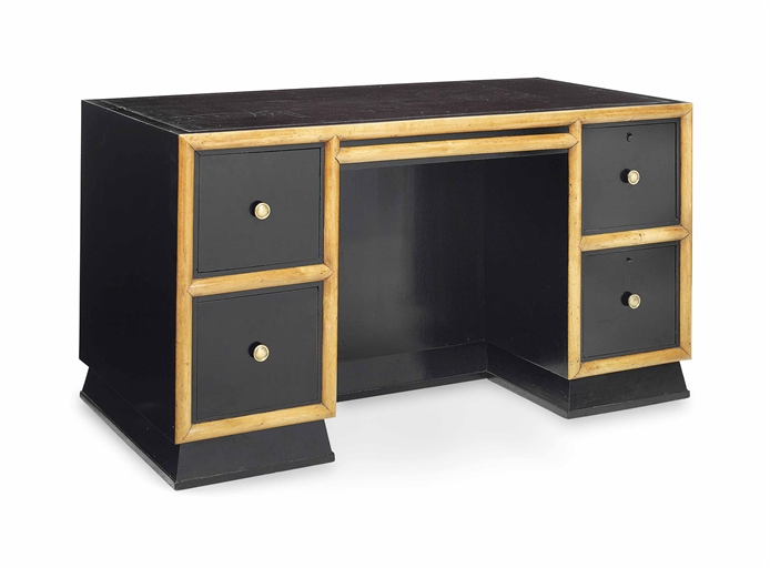 AN ART DECO EBONISED AND BIRCH-MOUNTED DESK 
CIRCA 1930-40 
With black leather-lined top above a