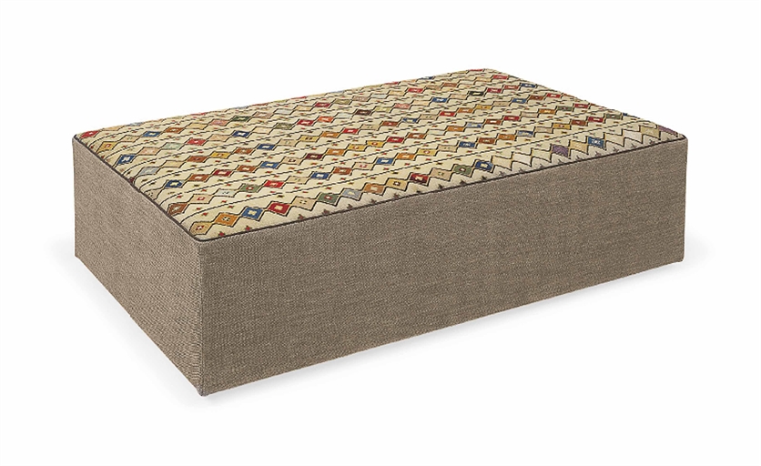 A GEOMETRIC NEEDLEWORK-COVERED OTTOMAN 
BY COLEFAX AND FOWLER, MODERN 
15 in. (38 cm.) high; 59