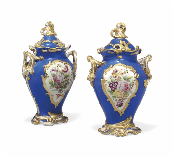 A PAIR OF COALPORT TWO-HANDLED BLUE-GROUND POT-POURRI VASES AND COVERS 
CIRCA 1840 
Painted with