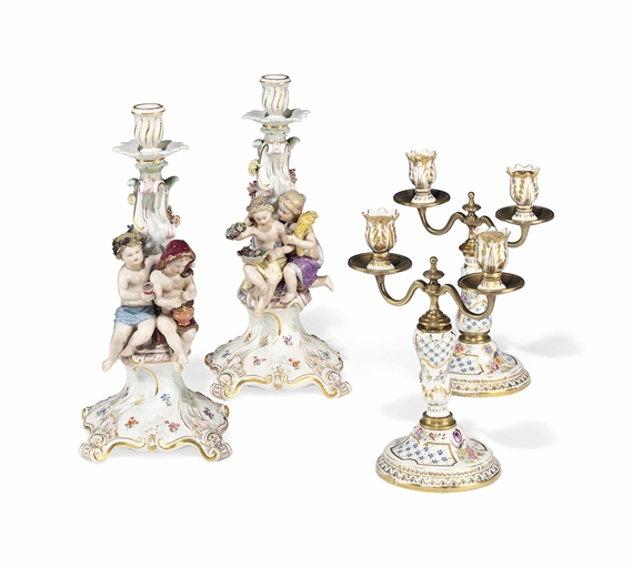 A PAIR OF MEISSEN FIGURAL CANDLESTICKS EMBLEMATIC OF THE SEASONS 
LATE 19TH CENTURY, BLUE CROSSED