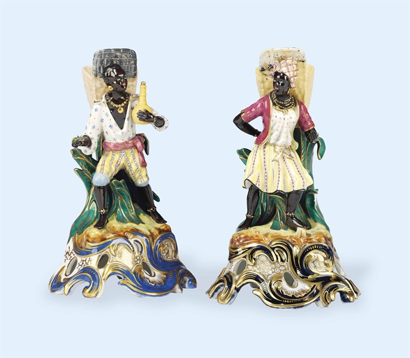 A PAIR OF RUSSIAN PORCELAIN BLACKAMOOR FIGURES 
BY THE KORNILOV FACTORY, CIRCA 1845, RED PRINTED