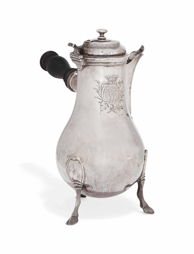 A FRENCH SILVER CHOCOLATE-POT 
MAKER'S MARK INDISTINCT ?L, CIRCA 1775 
Pear-shaped on three hoof