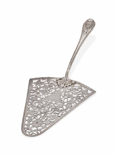 A GEORGE III SILVER FISH SLICE 
MARK OF EDWARD ALDRIDGE, LONDON, 1770 
The triangular blade with