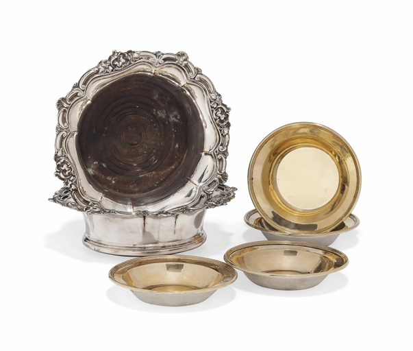 A SET OF FOUR VICTORIAN PARCEL-GILT SILVER BUTTER DISHES 
MARK OF JOHN TEARE, LONDON, 1847 
Plain