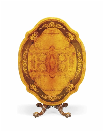 A VICTORIAN BURR WALNUT AND MARQUETRY CENTRE TABLE 
CIRCA 1860 
The tilt-top with a border of