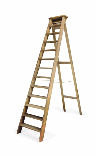 A LARGE PINE FOLDING LADDER 
20TH CENTURY 
With thirteen treads 
116 in. (295 cm.) high 
View on