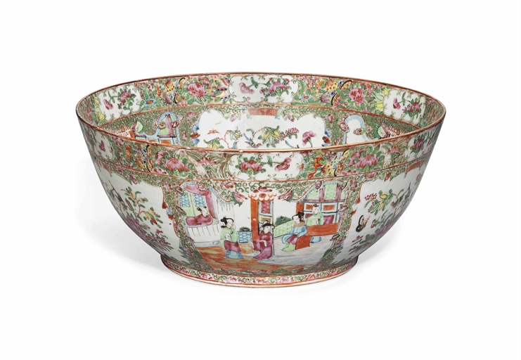 A LARGE CANTONESE FAMILLE ROSE PUNCH BOWL 
19TH CENTURY 
Decorated and gilt with shaped panels