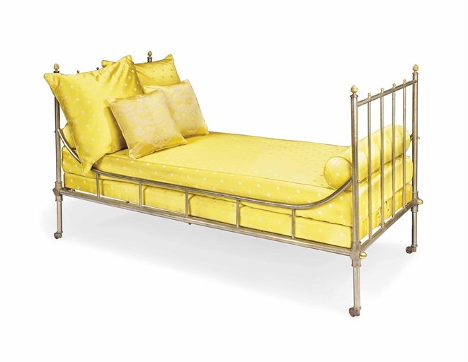 A FRENCH STEEL AND GILT-BRASS DAYBED 
OF EMPIRE STYLE, CIRCA 1900 
Re-upholstered in embroidered