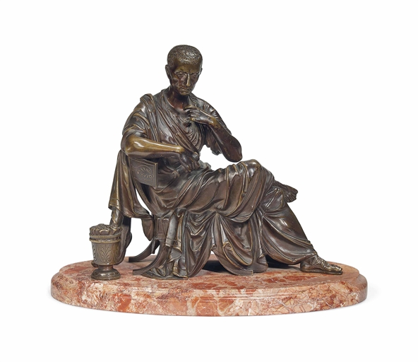 AN ITALIAN BRONZE MODEL OF JULIUS CAESAR 
LATE 19TH CENTURY 
Reclining with a scroll in his hand,