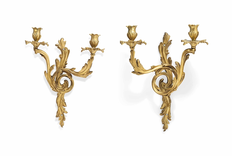 A SET OF FOUR GILT-BRONZE TWO-LIGHT WALL-APPLIQUES 
OF LOUIS XVI STYLE, EARLY 20TH CENTURY 
Each