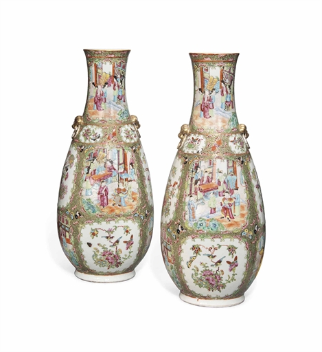 A LARGE PAIR OF CANTONESE FAMILLE ROSE VASES 
19TH CENTURY 
Each of elongated pear shape, with two