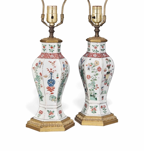 A PAIR OF ORMOLU-MOUNTED FAMILLE VERTE HEXAGONAL BALUSTER VASES 
KANGXI PERIOD (1662-1722) 
Each