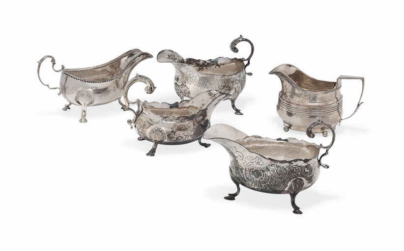 A PAIR OF GEORGE III OVAL SILVER SAUCEBOATS 
MAKER'S MARK INDISTINCT, LONDON, 1776 
Chased with