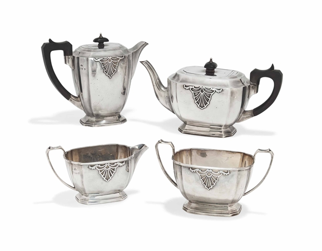 A FOUR-PIECE SILVER TEA-SET 
MARK OF ELKINGTON AND CO., BIRMINGHAM, 1913 
Shaped octagonal on