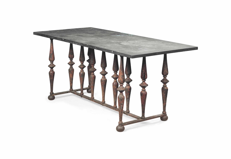 A RED-PAINTED CAST IRON CENTRE TABLE 
PART 19TH CENTURY AND LATER 
The later slate top on baluster