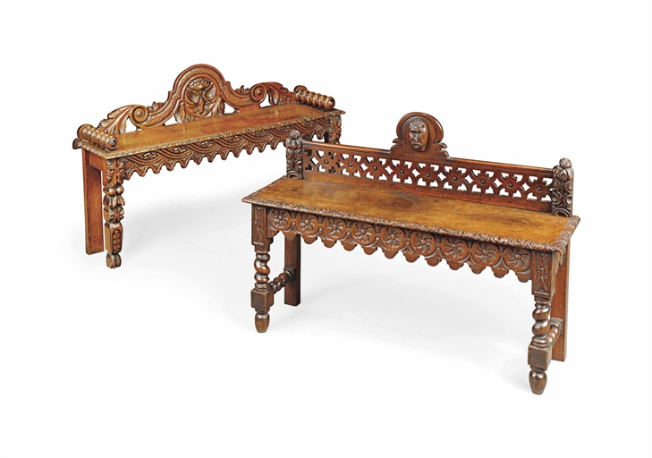 TWO LATE VICTORIAN CARVED OAK HALL BENCHES 
CIRCA 1900 
Each with a pierced carved gallery back