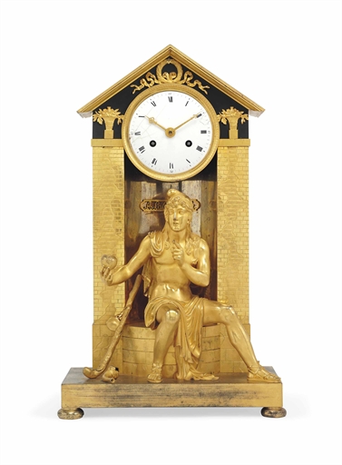 AN EMPIRE ORMOLU AND PATINATED-BRONZE STRIKING MANTEL CLOCK 
EARLY 19TH CENTURY 
CASE: the case