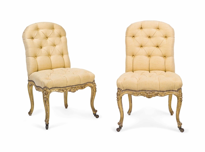 A PAIR OF NAPOLEON III GILTWOOD SIDE CHAIRS 
CIRCA 1870 
Each with buttoned silk-covered back and