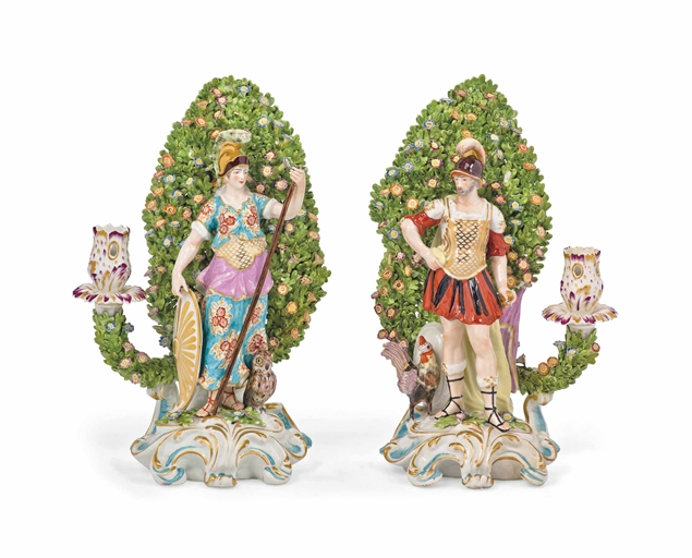 A PAIR OF CONTINENTAL PORCELAIN FIGURAL CANDLESTICKS 
CIRCA 1900, POSSIBLY SAMSON, GOLD ANCHOR MARKS