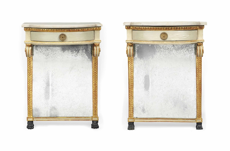 A PAIR OF NORTH EUROPEAN GREEN-PAINTED, PARCEL-GILT AND EBONISED CONSOLES
LATE 18TH/EARLY 19TH