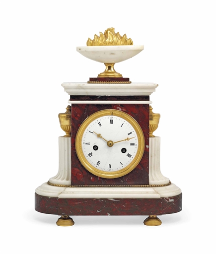 A LOUIS XVI ORMOLU-MOUNTED MARBLE STRIKING MANTEL CLOCK 
LATE 18TH CENTURY 
CASE: the rouge