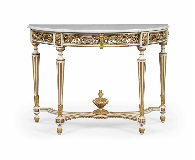 A LOUIS XVI-STYLE PARCEL-GILT AND WHITE-PAINTED CONSOLE TABLE 
LATE 19TH/EARLY 20TH CENTURY 
The