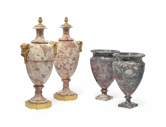 A PAIR OF FRENCH ORMOLU-MOUNTED PINK BRECCIA MARBLE VASES 
CIRCA 1900 
With pineapple finials and