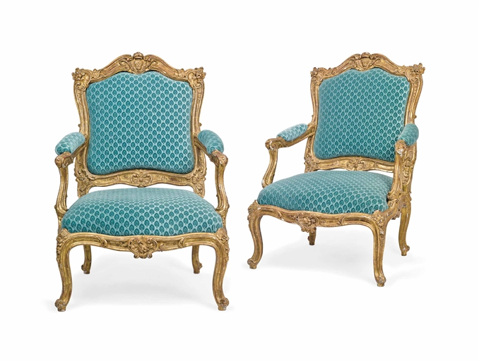 A PAIR OF LOUIS XV-STYLE GILTWOOD FAUTEUILS 
LATE 19TH/EARLY 20TH CENTURY 
Each with c-scroll and