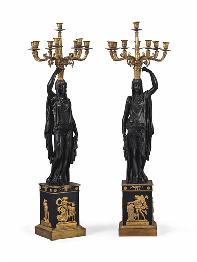 A PAIR OF EMPIRE-STYLE ORMOLU AND PATINATED BRONZE EIGHT-LIGHT CANDELABRA
LATE 19TH CENTURY 
Each