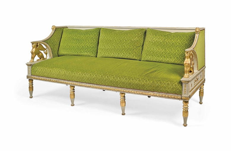 A SWEDISH PARCEL-GILT AND GREY-PAINTED SOFA 
EARLY 19TH CENTURY, REDUCED IN LENGTH 
With sphinx