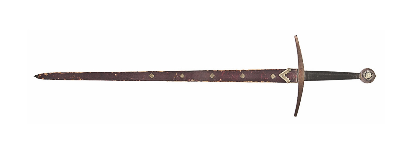 A CEREMONIAL TWO-HAND BROADSWORD 
LATE 19TH CENTURY 
With tapering double-edged blade, copper-